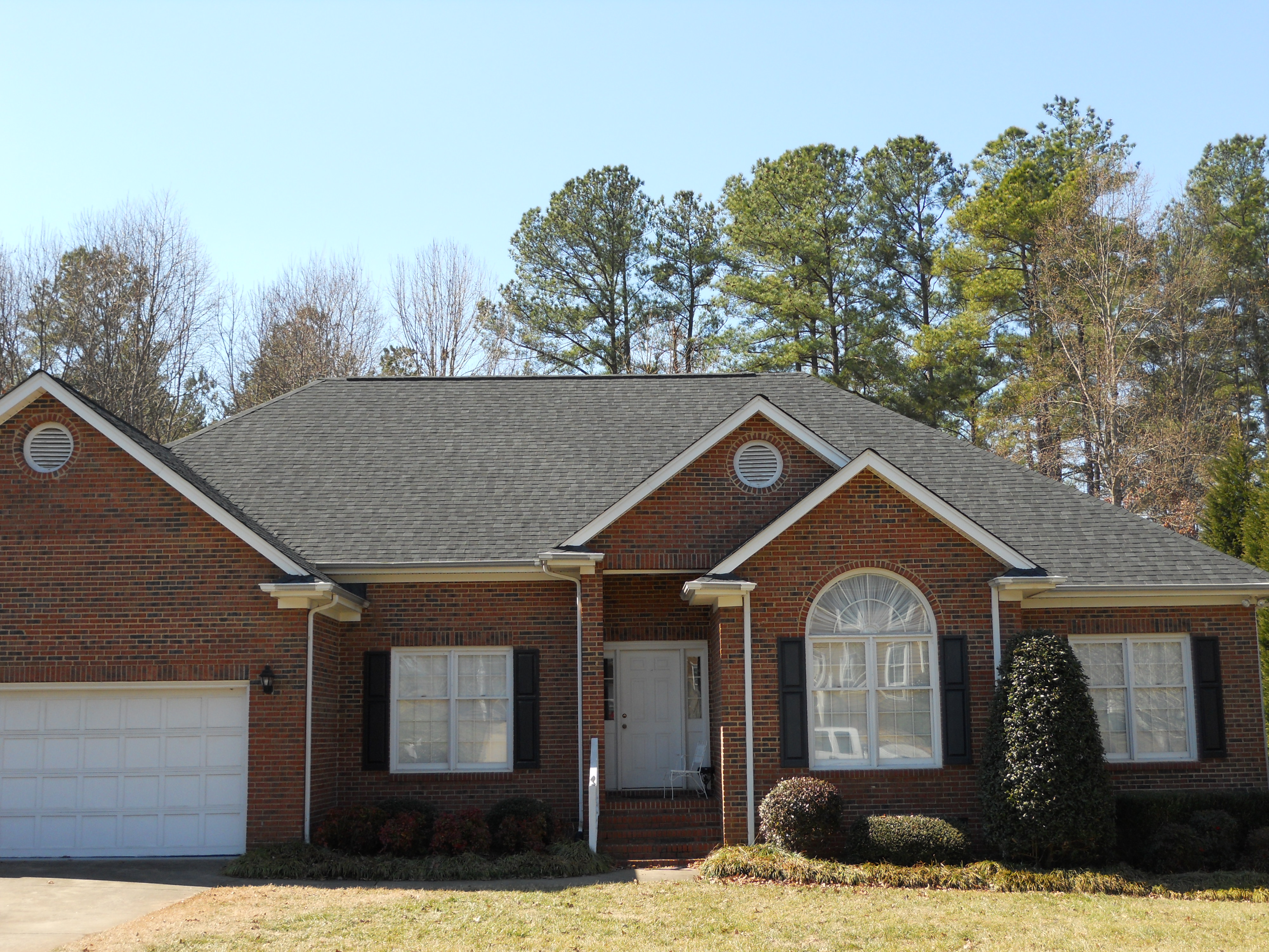 Completed residential roof replacement by Precision Roofing LLC in Gaston County